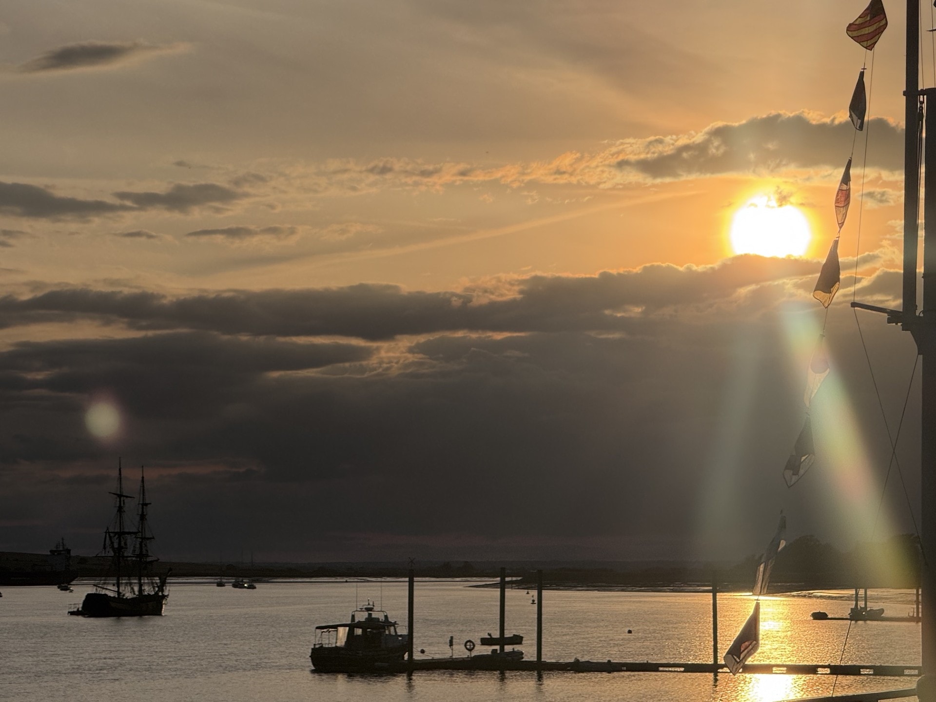 Burnham on Crouch at sunset with sailing boats on the River Crouch